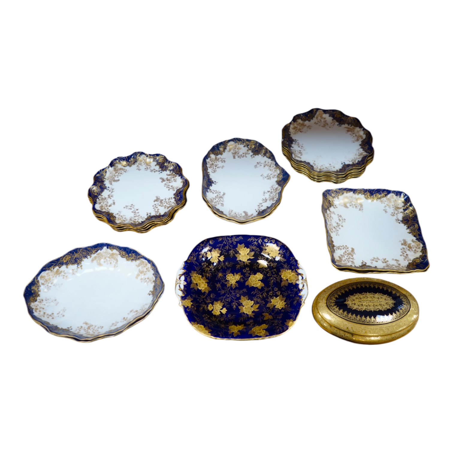 A collection of porcelain to include a Royal Doulton part dessert set, a Limoges gilt oval box and cover and a similar Davenport dish, largest 26cm wide. Condition - mostly fair